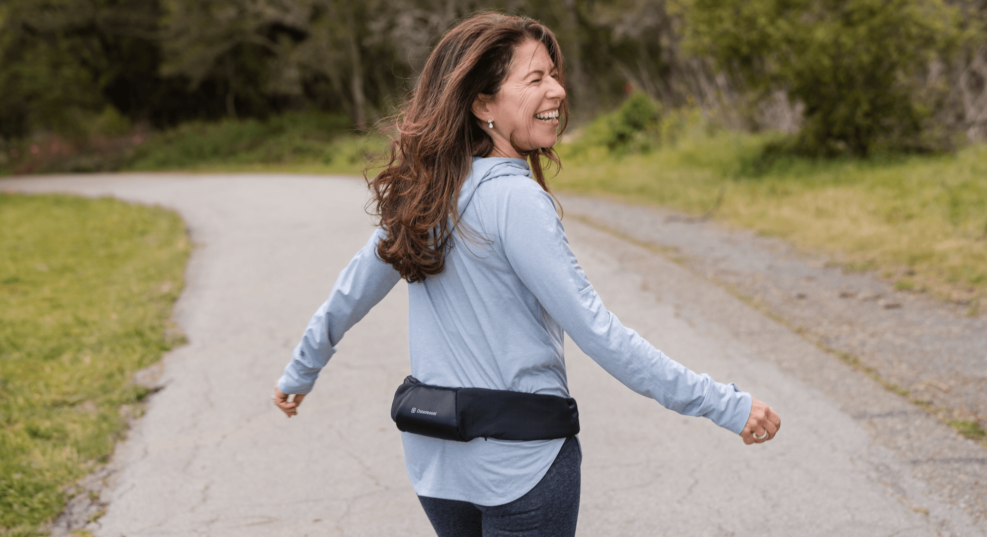 Osteoboost CEO Laura Yecies walking while wearing Osteoboost